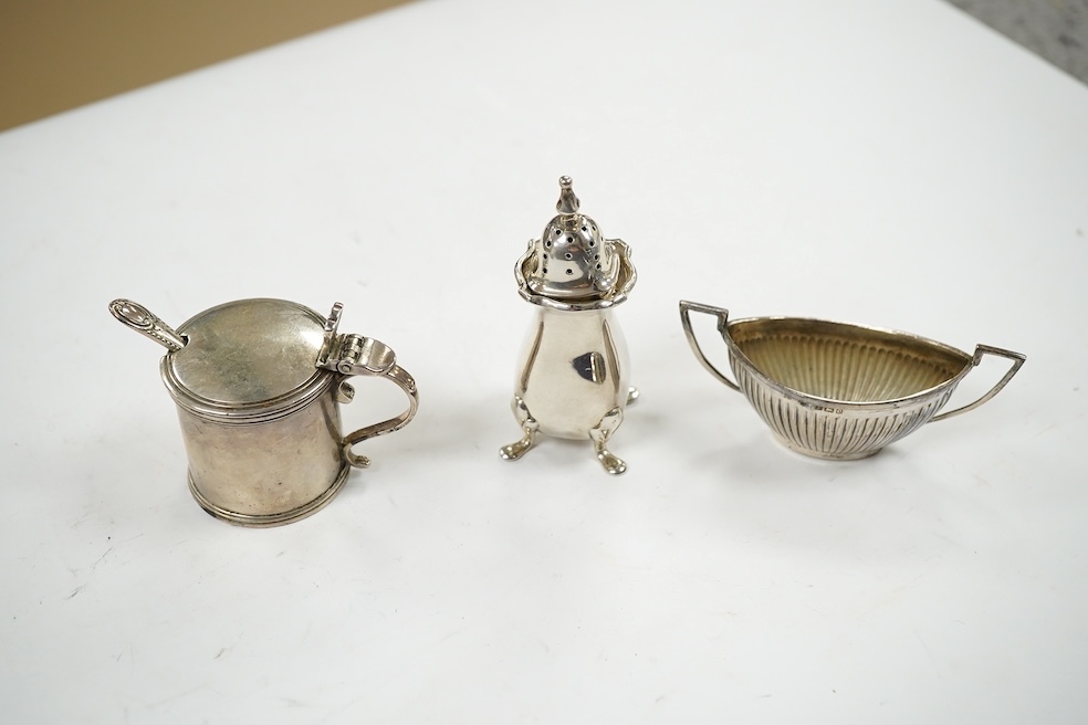 A collection of small collectable silver including card cases, condiments, tea strainer, sovereign case (a.f.) etc. Condition - poor to fair